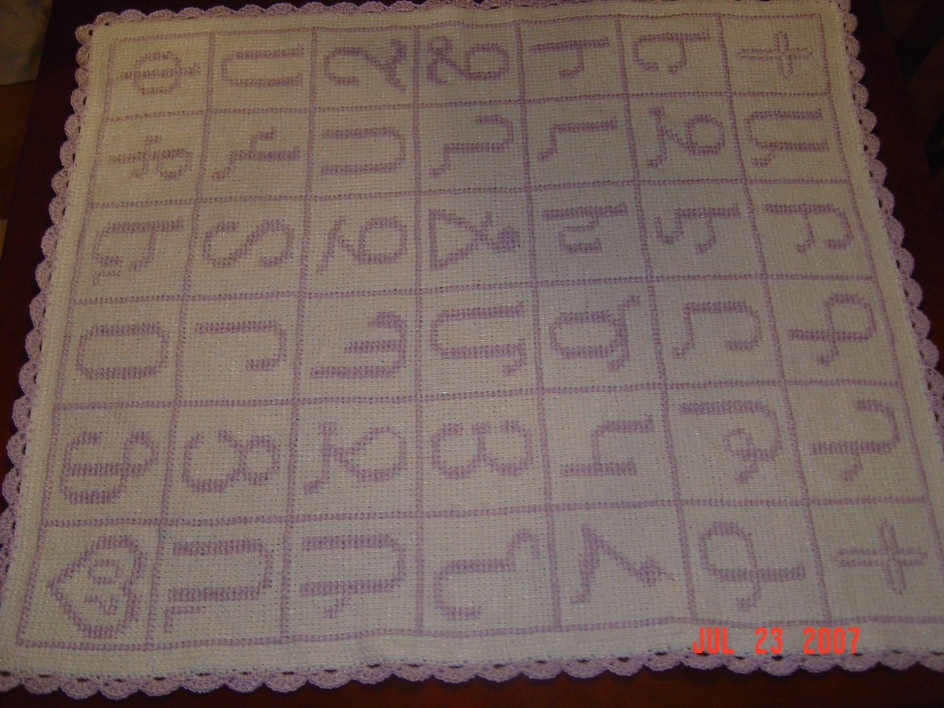Full Armenian alphabet hand cross-stitched on a baby blanket by Lusik